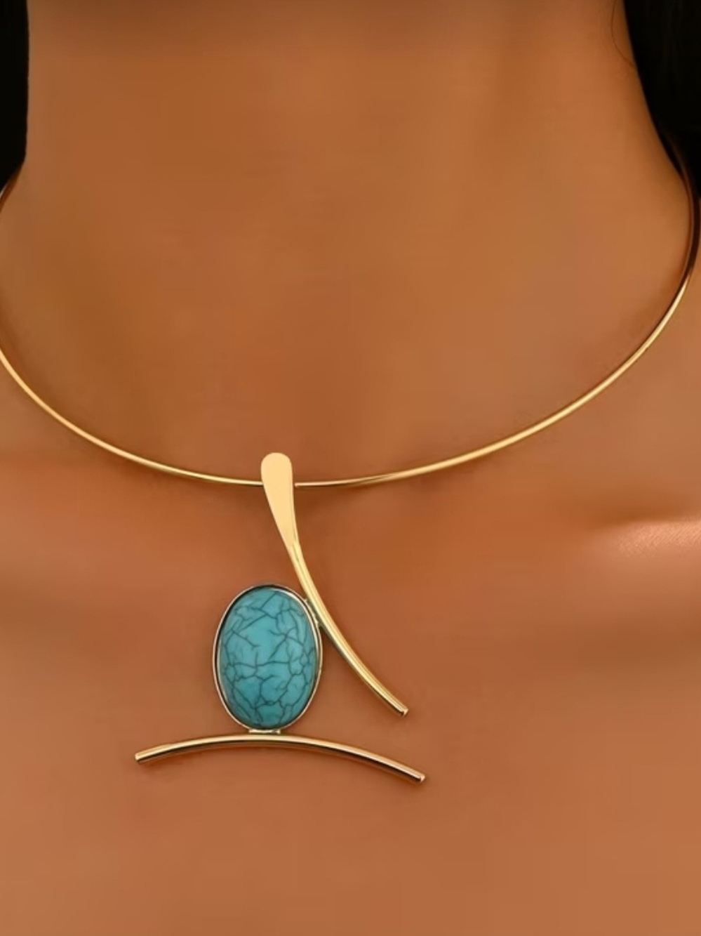 Make a bold statement with this stunning modernist torque choker necklace!